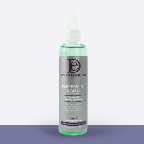 A bottle of Design Essentials Peppermint & Aloe Scalp Tonic