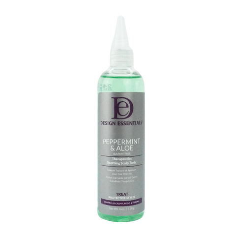 A bottle of Design Essentials Peppermint & Aloe Scalp Tonic.